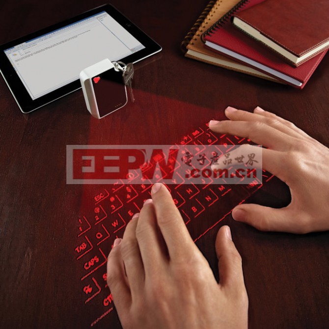 CTX's Virtual Keyboard projects a usable laser outline of a QWERTY keyboard onto any flat ...